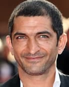 Amr Waked as Dr. Djuric