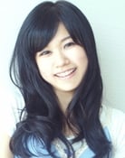 Asami Yano as Female Cyclist (voice) and TV Announcer (voice)