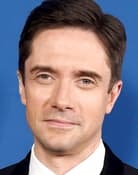 Topher Grace as Tom