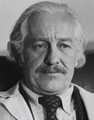 Strother Martin as R.J. Hawkins