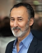 Ercan Durmaz as Karim Al-Baroudi