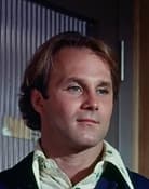 Jonathan Welsh as Glenn Olsen, young cop (1976-1978)