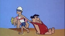 Fred Flintstone la plajă