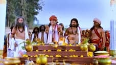 Krishna lifts the Govardhan hill