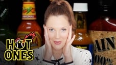 Drew Barrymore Has a Hard Time Processing While Eating Hot Wings