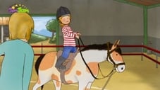 Conni se učí jezdit na koni